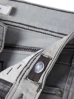 Short à 5 poches en coton gris uni avec une fermeture zippée et bouton