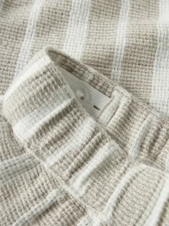 Short chino en coton biologique beige à rayures pourvu d'une coupe droite
