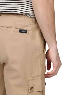 Short cargo en coton mélangé de couleur beige uni avec une coupe droite