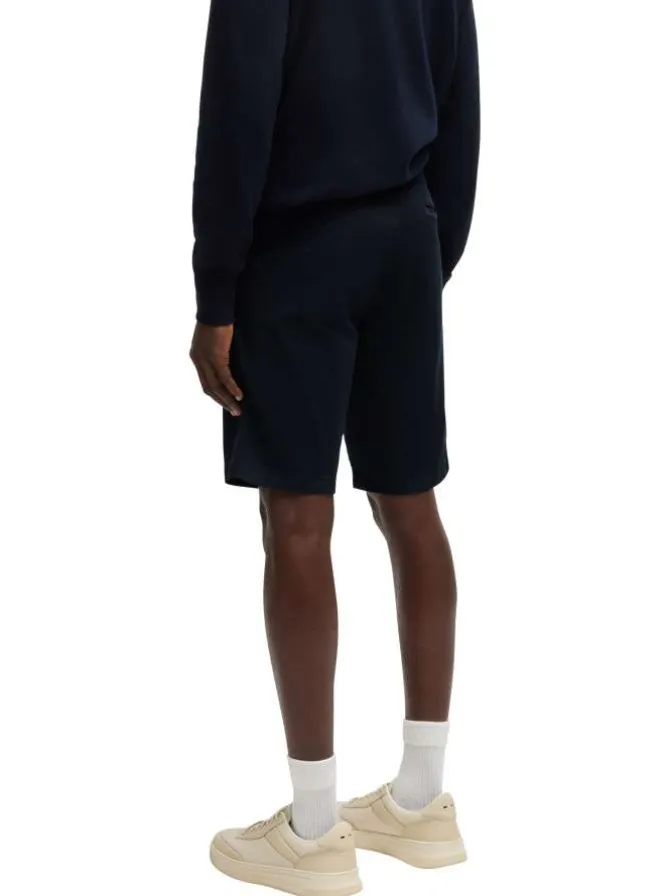Short chino en coton bleu marine uni à coupe regular fit avec des passants