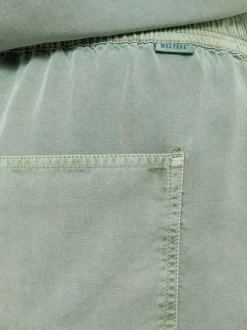 Short chino kaki uni pourvu d'une coupe ample et d'une taille élastiquée