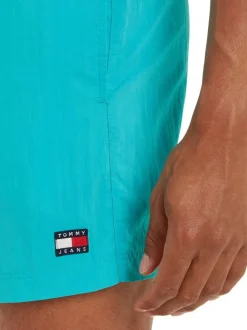 Short de bain canard uni avec une coupe droite et poche arrière
