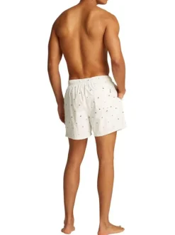 Short de bain écru brodé de drapeaux all-over et taille élastiquée
