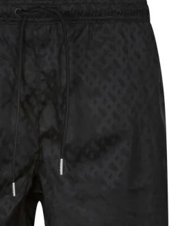 Short de bain de couleur noire avec des imprimés et une coupe droite