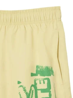 Short de bain jaune avec un imprimé à l'avant et une coupe droite