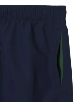 Short de bain marine à coupe ajustée pourvu du logo de la marque