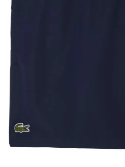 Short de bain marine à coupe ajustée pourvu du logo de la marque