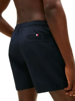 Short de bain marine à coupe ajustée pourvu du nom de la marque