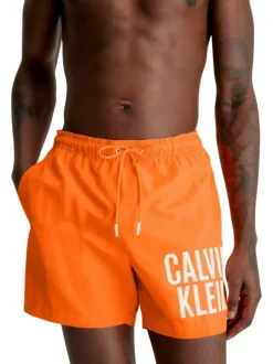 Short de bain orange uni avec une poche arrière et nom de la marque