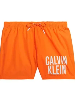 Short de bain orange uni avec une poche arrière et nom de la marque