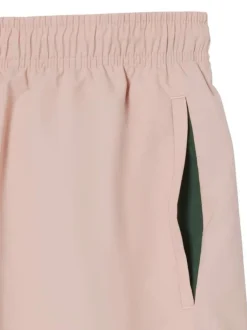 Short de bain rose à coupe ajustée pourvu du logo de la marque