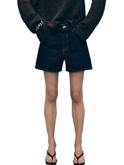 Short denim en coton bleu foncé uni à coupe large avec des surpiqûres camels