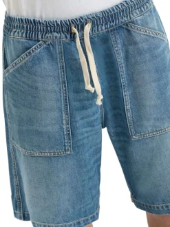 Short en coton bleu uni avec une coupe droite et une taille élastiquée