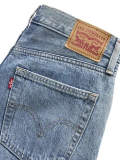 Short en coton bleu uni avec une coupe droite et un patch à la taille