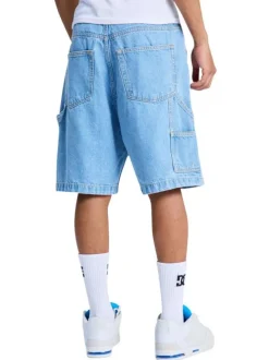 Short en coton bleu uni pourvu d'une coupe baggy et de multiples poches