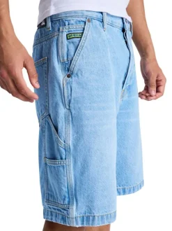 Short en coton bleu uni pourvu d'une coupe baggy et de multiples poches