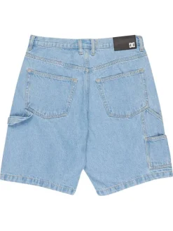 Short en coton bleu uni pourvu d'une coupe baggy et de multiples poches