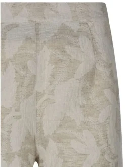 Short en coton et lin mélangés beige à coupe ample pourvu d'une fermeture zippée