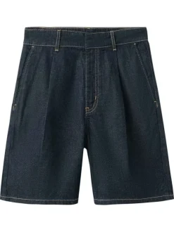 Short en coton indigo uni pourvu d'une taille mi-haute et d'une coupe droite
