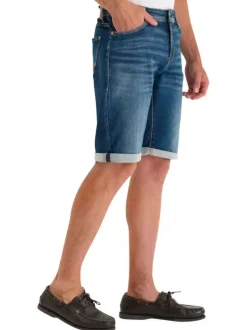 Short en coton mélangé bleu uni avec une coupe droite muni d'un zip