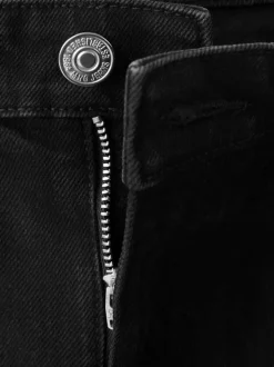 Short en coton noir uni pourvu de passants pour la ceinture