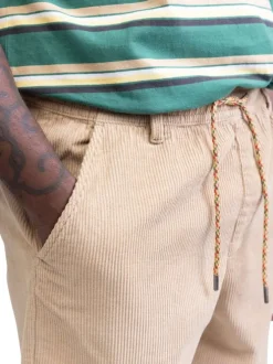 Short jogging en coton beige uni avec une coupe droite et une taille élastiquée
