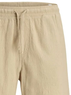 Short jogging en coton beige uni avec une coupe droite et une taille élastiquée