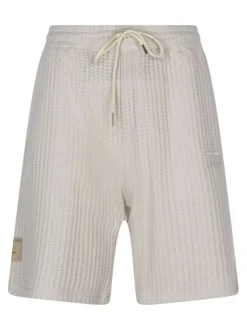 Short jogging en coton mélangé écru uni avec une coupe droite