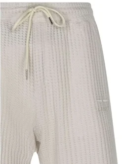 Short jogging en coton mélangé écru uni avec une coupe droite
