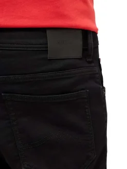 Short 5 poches en coton mélangé noir uni avec une coupe droite