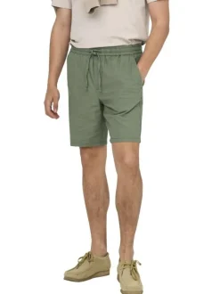 Short vert uni en coton et lin mélangé avec une coupe droite