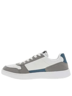 Sneakers en cuir blanc à logo siliconé jaune débossé à l'extérieur de la tige