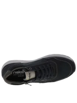 Sneakers en cuir noires avec semelle à talon compensé bas et zip latéral