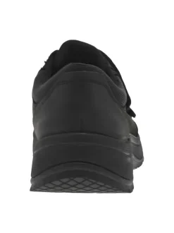 Sneakers en cuir noires à talon plat et à bandes auto-agrippantes