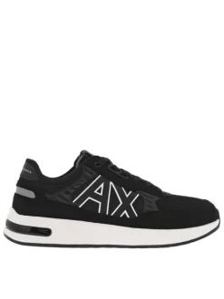 Sneakers monochromes noires à doublure néoprène, semelle semi-compensée blanche