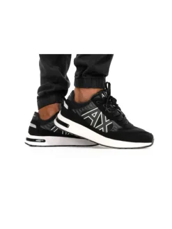 Sneakers monochromes noires à doublure néoprène, semelle semi-compensée blanche