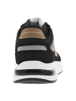 Sneakers noires à doublure néoprène et semelle semi-compensée blanche