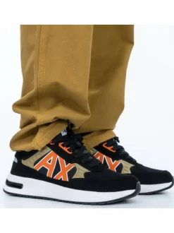 Sneakers noires à doublure néoprène et semelle semi-compensée blanche