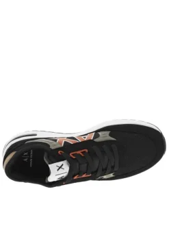 Sneakers noires à doublure néoprène et semelle semi-compensée blanche