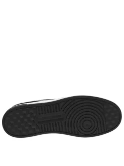 Sneakers tennis en cuir noir à semelle blanche semi-compensée et lacets plats