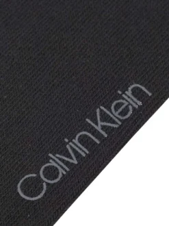 Socquettes noires unie avec initiales de la marque collées en strass
