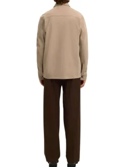 Surchemise beige uni avec un col boutonné et des manches longues