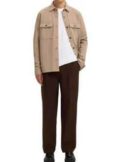 Surchemise beige uni avec un col boutonné et des manches longues