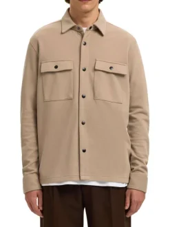 Surchemise beige uni avec un col boutonné et des manches longues
