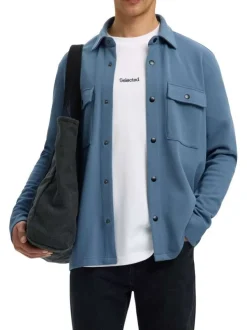 Surchemise bleue uni avec un col boutonné et des manches longues
