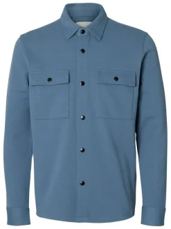 Surchemise bleue uni avec un col boutonné et des manches longues