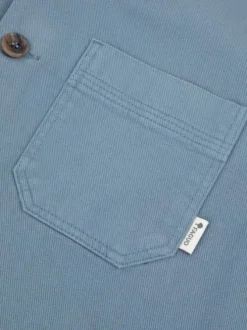 Surchemise en coton bleue unie avec une coupe droite et un col français
