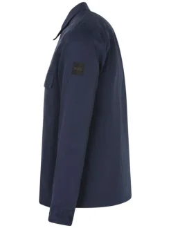 Surchemise en coton bleu uni avec une coupe oversize et un col à revers
