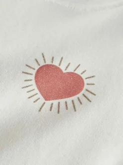 Sweat blanc uni pourvu d'un imprimé coeur et d'une coupe droite
