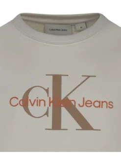 Sweat en coton beige uni avec un col rond et le nom de la marque imprimé